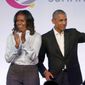 Former President Barack Obama, right, and former first lady Michelle Obama appear at the Obama Foundation Summit in Chicago, Oct. 31, 2017. (AP Photo/Charles Rex Arbogast) ** FILE **
