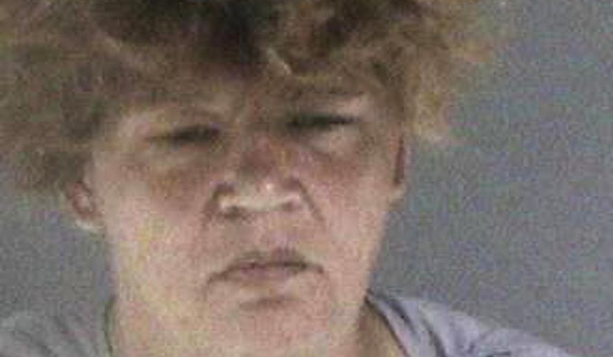 This photo released April 30, 2019, by the Oakland Police Department shows Margret Goodlife. Police identified a woman as 41-year-old Goodlife and said she was charged Tuesday with attempted homicide on a police officer. Goodlife was arrested in stabbing last week of an Oakland police officer as he walked to his car after getting off work. (Oakland Police Department via AP)