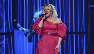 Kelly Clarkson performs &quot;Broken &amp; Beautiful&quot; at the Billboard Music Awards on Wednesday, May 1, 2019, at the MGM Grand Garden Arena in Las Vegas. (Photo by Chris Pizzello/Invision/AP)