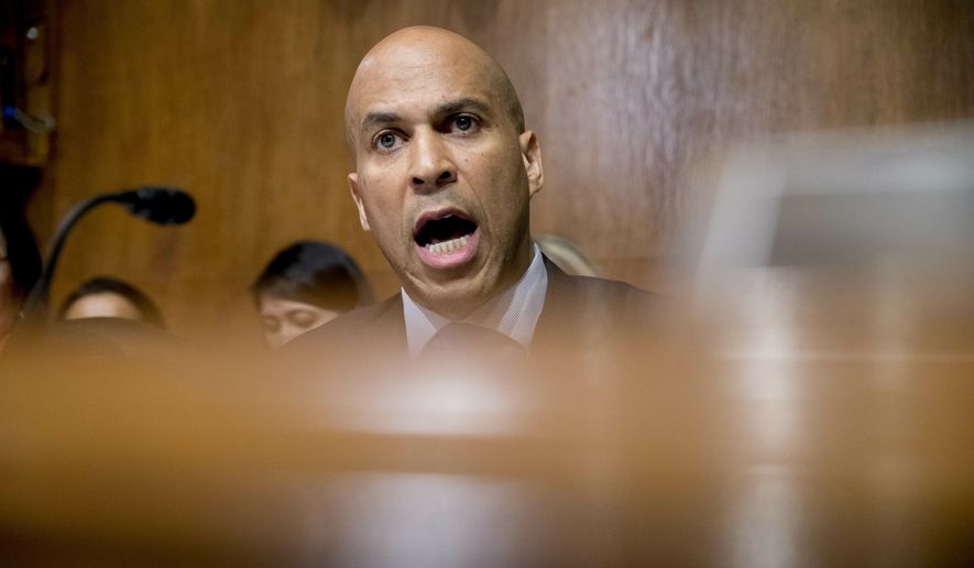 Democratic presidential candidate Sen. Cory Booker, D-N.J., speaks as Attorney General William Barr testifies during a Senate Judiciary Committee hearing on Capitol Hill in Washington, Wednesday, May 1, 2019, on the Mueller Report. (AP Photo/Andrew Harnik)