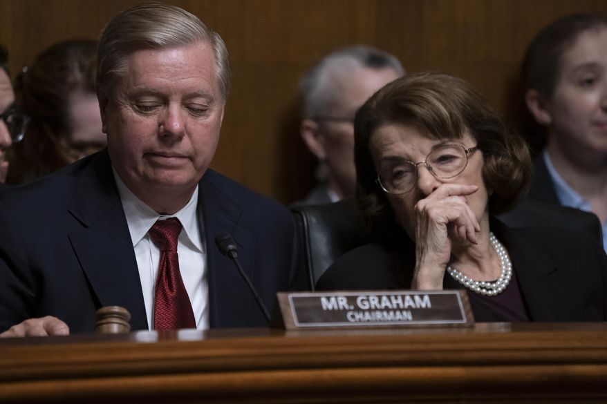 Senate Judiciary Committee Chairman Lindsey Graham, R-S.C., left, and Sen. Dianne Feinstein, D-Calif., the ranking member, prepare to take a break during a hearing on Capitol Hill in Washington, Wednesday, May 1, 2019. (AP Photo/J. Scott Applewhite) ** FILE **