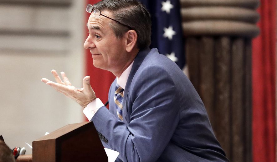 House Speaker Glen Casada, R-Franklin, talks with a colleague Wednesday, May 1, 2019, in Nashville, Tenn. The GOP-supermajority House and Senate passed a negotiated version of the bill that would increase the amount of public dollars that can pay for private tuition and other expenses. (AP Photo/Mark Humphrey)