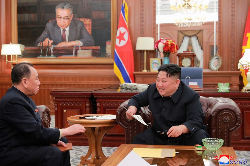 In this Wednesday, Jan. 23, 2019, photo provided on Thursday, Jan. 24, 2019, by the North Korean government, North Korean leader Kim Jong-un, right, meets Kim Yong-chol, who traveled to Washington to discuss denuclearization talks, in Pyongyang. (Korean Central News Agency/Korea News Service via AP)