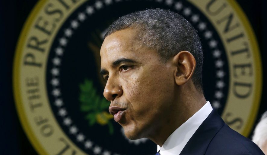 With the presidential seal on the wall behind him, President Barack Obama gestures as he speaks in the Eisenhower Executive Office Building, on the White House campus in Washington, Wednesday, Nov. 28, 2012, about how middle class Americans would see their taxes go up if Congress fails to act to extend the middle class tax cuts. The president said he believes that members of both parties can reach a framework on a debt-cutting deal before Christmas. (AP Photo/Pablo Martinez Monsivais)