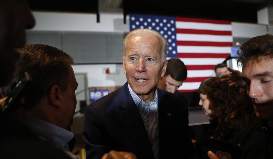 Former Vice President and Democratic presidential candidate Joe Biden greets audience members during a rally, Tuesday, April 30, 2019, in Cedar Rapids, Iowa. (AP Photo/Charlie Neibergall)