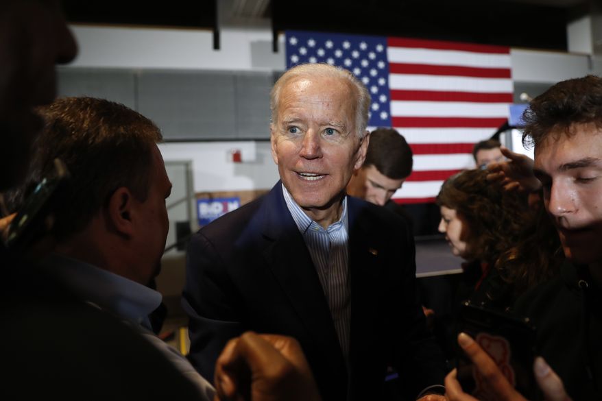 Former Vice President and Democratic presidential candidate Joe Biden greets audience members during a rally, Tuesday, April 30, 2019, in Cedar Rapids, Iowa. (AP Photo/Charlie Neibergall)