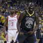 Golden State Warriors&#39; Draymond Green (23) reacts after scoring, in front of Houston Rockets&#39; Chris Paul (3) during the second half of Game 2 of a second-round NBA basketball playoff series in Oakland, Calif., Tuesday, April 30, 2019. (AP Photo/Jeff Chiu)
