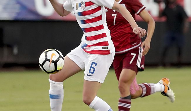 FILE - In this April 5, 2018, file photo, United States&#x27; Morgan Brian (6) controls the ball in front of Mexico&#x27;s Cristina Ferral (7) during the first half of an international friendly soccer match, in Jacksonville, Fla. Defender Ali Krieger and midfielders Allie Long and Morgan Brian have been included on the U.S. national team roster for the Women’s World Cup in France. All three were widely considered on the bubble for the 23-player roster announced Thursday, May 2, 2019, by coach Jill Ellis. The United States is the defending champion of soccer’s premier tournament, which starts on June 7. (AP Photo/John Raoux, File)