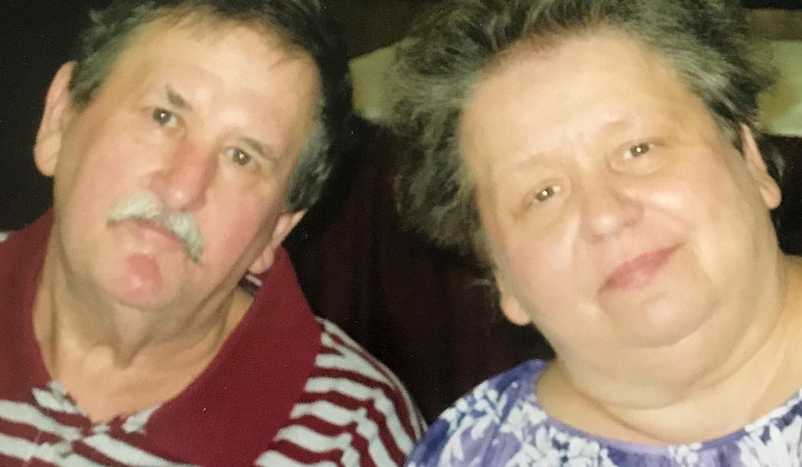 This undated family photo provided by Debbie Pike shows Clair "Cos" Vance, left, and his wife, Jeanne Vance, of Erie, Pa. The couple both died April 28, 2019, of natural causes. Family members say they had been married for almost 45 years and passed away within minutes of each other. (Debbie Pike via AP)
