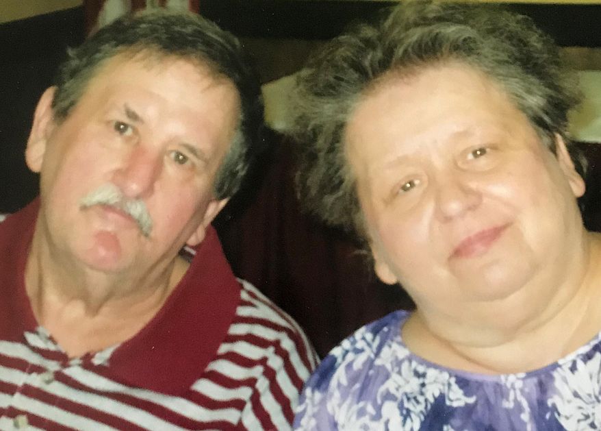 This undated family photo provided by Debbie Pike shows Clair "Cos" Vance, left, and his wife, Jeanne Vance, of Erie, Pa. The couple both died April 28, 2019, of natural causes. Family members say they had been married for almost 45 years and passed away within minutes of each other. (Debbie Pike via AP)