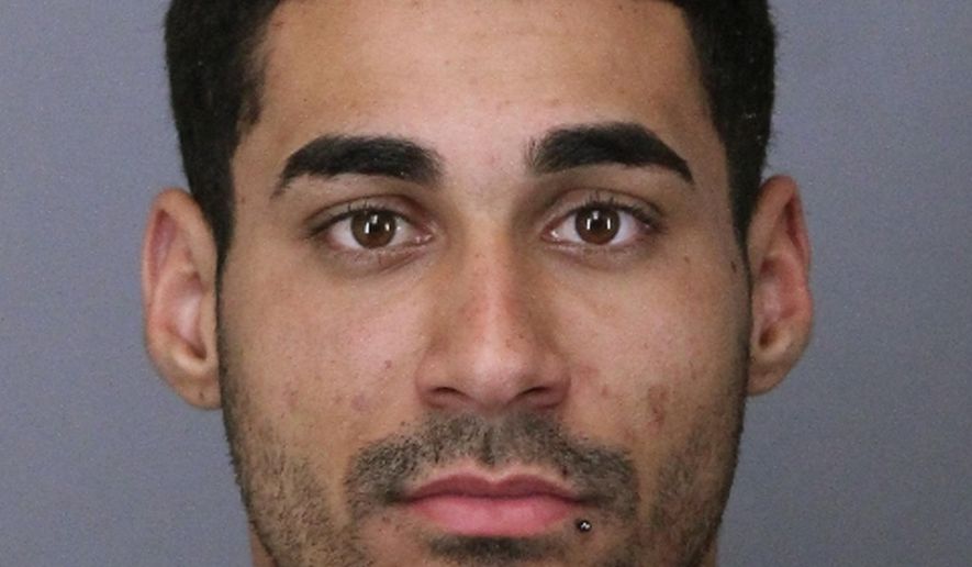 FILE - This file photo provided by the Lakewood Police Department on Friday, April 26, 2019, shows Rogel Lazaro Aguilera-Mederos. Prosecutors on Friday, May 3, 2019, filed 40 charges, including four counts of vehicular homicide, against the truck driver accused of causing a fiery interstate pileup that killed four people in Colorado. Jefferson County District Attorney Pete Weir said Aguilera-Mederos, of Houston, was "operating the vehicle under circumstances where he was exhibiting extreme indifference to the value of human life." (Lakewood Police Department via AP, File)