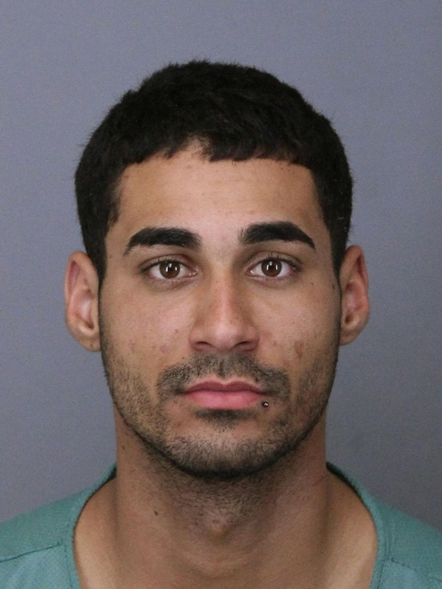 FILE - This file photo provided by the Lakewood Police Department on Friday, April 26, 2019, shows Rogel Lazaro Aguilera-Mederos. Prosecutors on Friday, May 3, 2019, filed 40 charges, including four counts of vehicular homicide, against the truck driver accused of causing a fiery interstate pileup that killed four people in Colorado. Jefferson County District Attorney Pete Weir said Aguilera-Mederos, of Houston, was "operating the vehicle under circumstances where he was exhibiting extreme indifference to the value of human life." (Lakewood Police Department via AP, File)