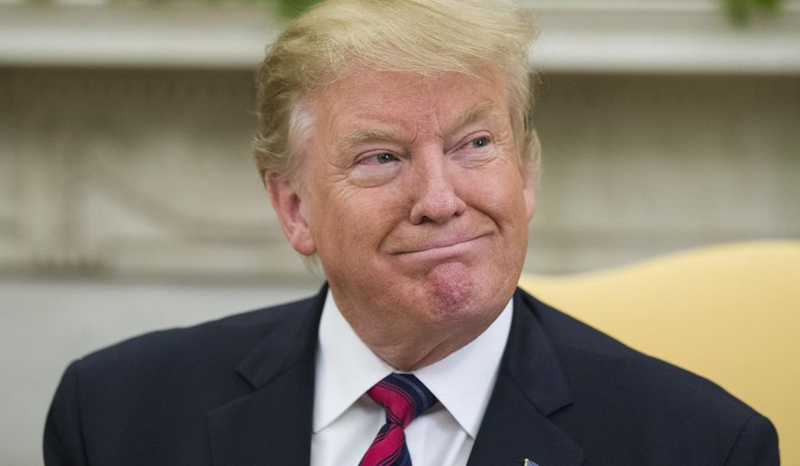 President Donald Trump smiles during a meeting with Slovak Prime Minister Peter Pellegrini in the Oval Office of the White House, Friday, May 3, 2019, in Washington. (AP Photo/Alex Brandon)