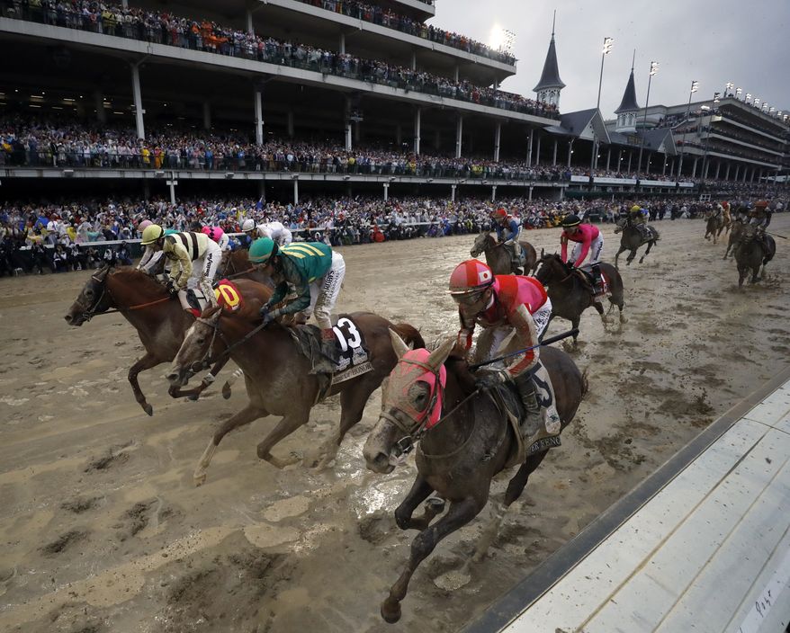 Flavien Prat ride Country House, left, to the finish line during the 145th running of the Kentucky Derby horse race at Churchill Downs Saturday, May 4, 2019, in Louisville, Ky. Country House was declared the winner after Maximum Security was disqualified following a review by race stewards. (AP Photo/Matt Slocum)