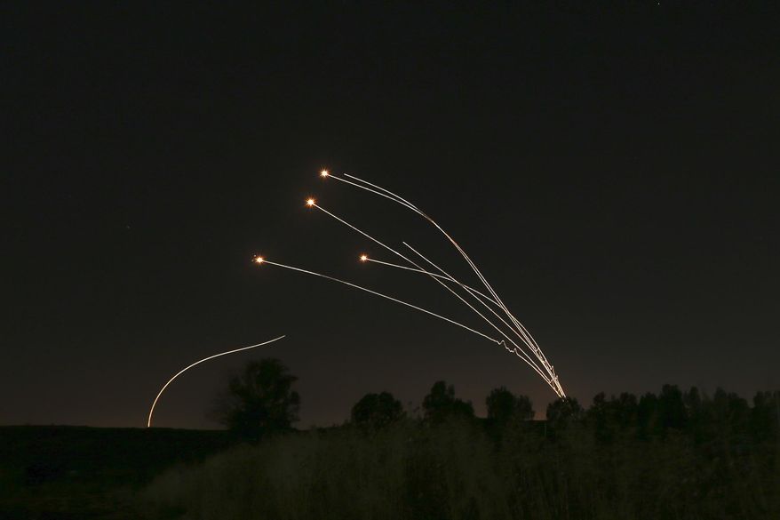 Israeli air defense system Iron Dome takes out rockets fired from Gaza near Sderot, Israel, Saturday, May 4, 2019. (AP Photo/Ariel Schalit) ** FILE **