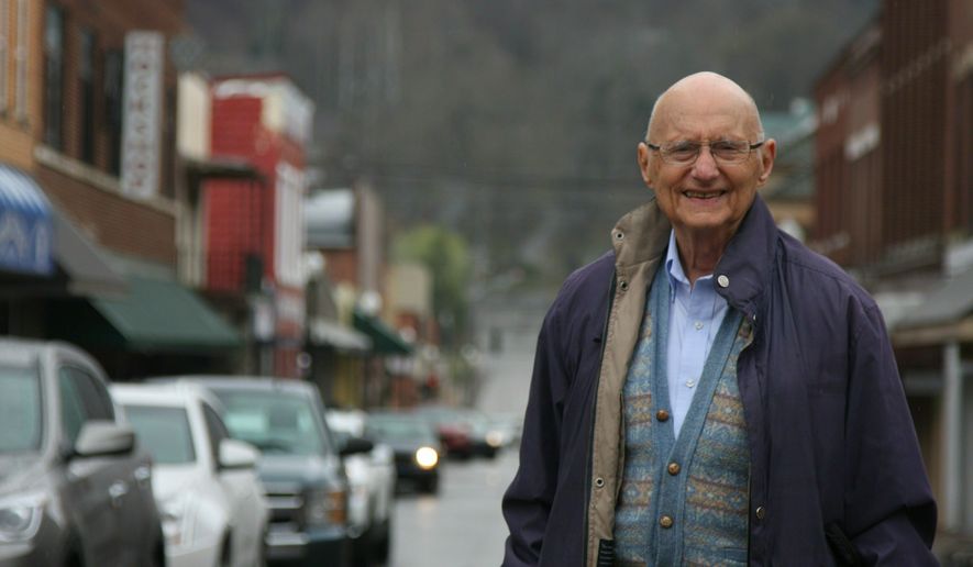 John Rosenberg, a Jewish attorney born into pre-Holocaust Germany, poses for a photo in Lexington, Ky. Rosenberg helped outlaw broad form deeds and created a free legal aid service that has provided legal services to thousands of poor people in Eastern Kentucky. (Caitlyn Stroh/Lexington Herald-Leader via AP)