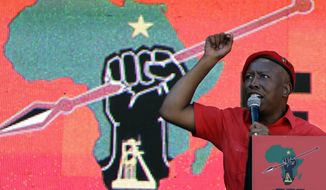 Leader of the Economic Freedom Fighters (EFF) party, Julius Malema, addresses supporters during an election rally at Orlando Stadium in Soweto, South Africa, Sunday, May 5, 2019. Campaign rallies for South Africa’s upcoming election have reached a climax Sunday with mass rallies by the ruling party and one of its most potent challengers.  (AP Photo/Themba Hadebe)