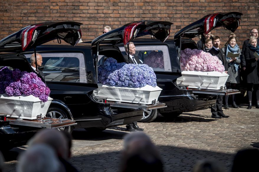 The funeral service for the three children of the CEO of clothing brand Bestseller, Anders Holch Povlsen and wife Anne, at Aarhus Cathedral, Denmark, Saturday May 4, 2019, who were victims of the bombings in Sri Lanka on April 21. More than 350 people were killed in bombings of churches and hotels in Sri Lanka on Easter Sunday. (Mads Claus Rasmussen/Ritzau Scanpix via AP)