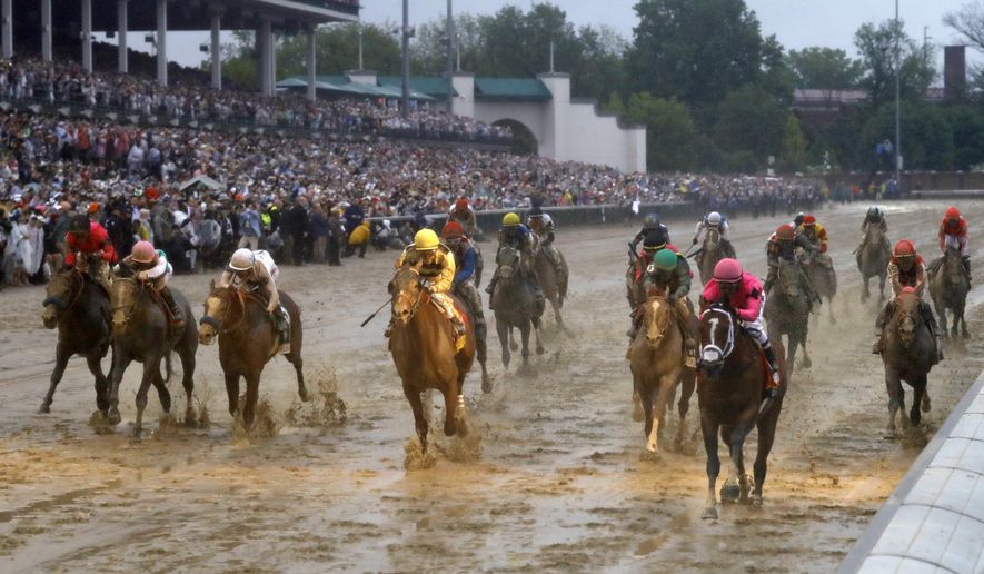 Luis Saez rides Maximum Security across the finish line first followed by Flavien Prat on Country House during the 145th running of the Kentucky Derby horse race at Churchill Downs Saturday, May 4, 2019, in Louisville, Ky. Country House was declared the winner after Maximum Security was disqualified following a review by race stewards. (AP Photo/Matt Slocum)