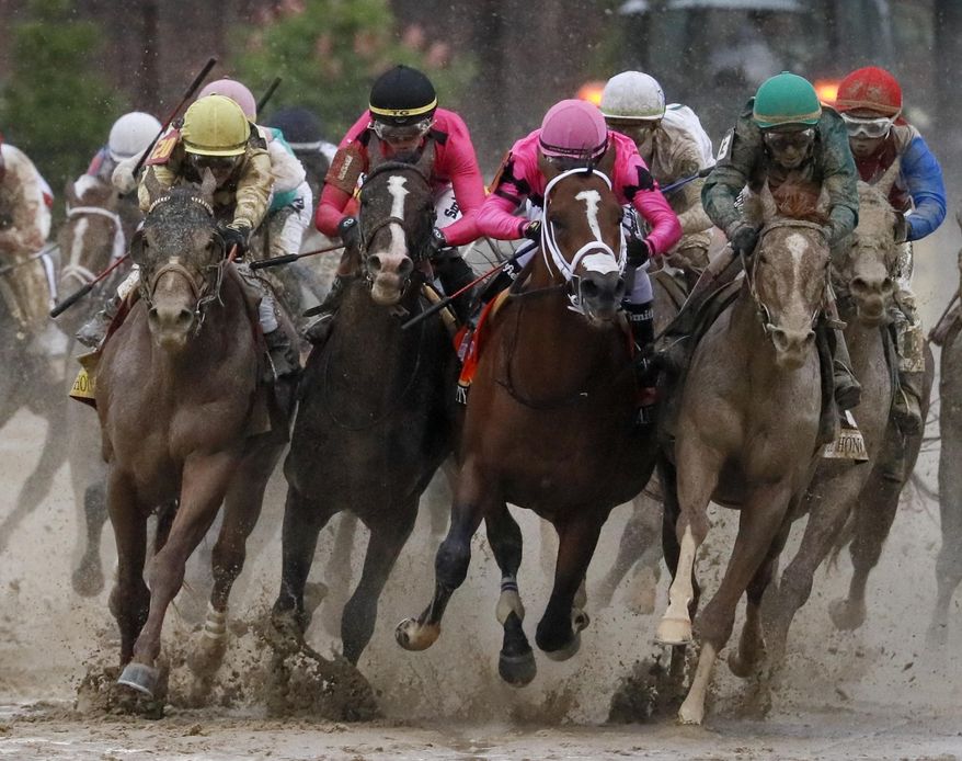 Luis Saez riding Maximum Security, second from right, goes around turn four with Flavien Prat riding Country House, left, Tyler Gaffalione riding War of Will and John Velazquez riding Code of Honor, right, during the 145th running of the Kentucky Derby horse race at Churchill Downs Saturday, May 4, 2019, in Louisville, Ky. (AP Photo/John Minchillo)