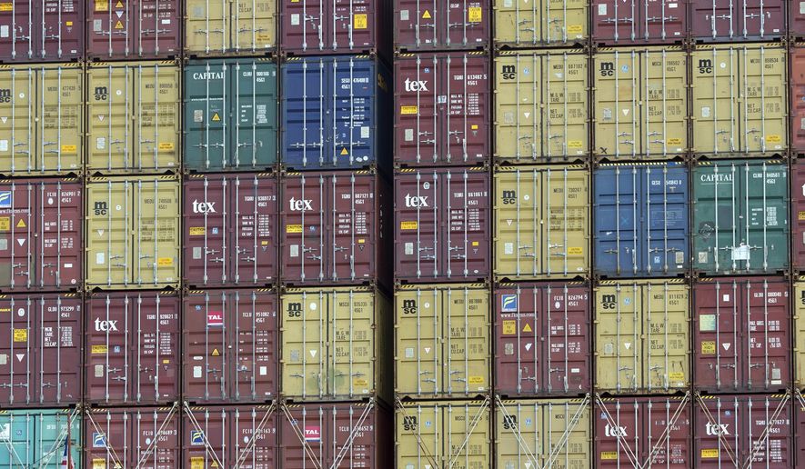 FILE - In this July, 5, 2018 photo, a bay of 40-foot shipping container fill the stern of a container ship at the Port of Savannah in Savannah, Ga. President Donald Trump turned up the pressure on China Sunday, May 5, 2019, threatening to hike tariffs on $200 billion worth of Chinese goods. (AP Photo/Stephen B. Morton, File)