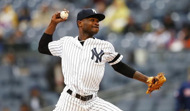 New York Yankees&#x27; starting pitcher Domingo German delivers against the Minnesota Twins in the first inning of a baseball game Sunday, May 5, 2019, in New York. (AP Photo/Noah K. Murray)