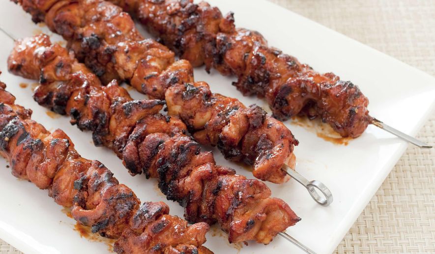 This undated photo provided by America's Test Kitchen in April 2019 shows Barbecued Chicken Kebabs in Brookline, Mass. This recipe appears in the cookbook "Master of the Grill." (Carl Tremblay/America's Test Kitchen via AP)