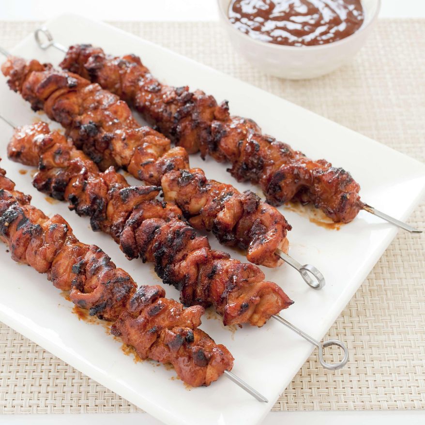 This undated photo provided by America's Test Kitchen in April 2019 shows Barbecued Chicken Kebabs in Brookline, Mass. This recipe appears in the cookbook "Master of the Grill." (Carl Tremblay/America's Test Kitchen via AP)