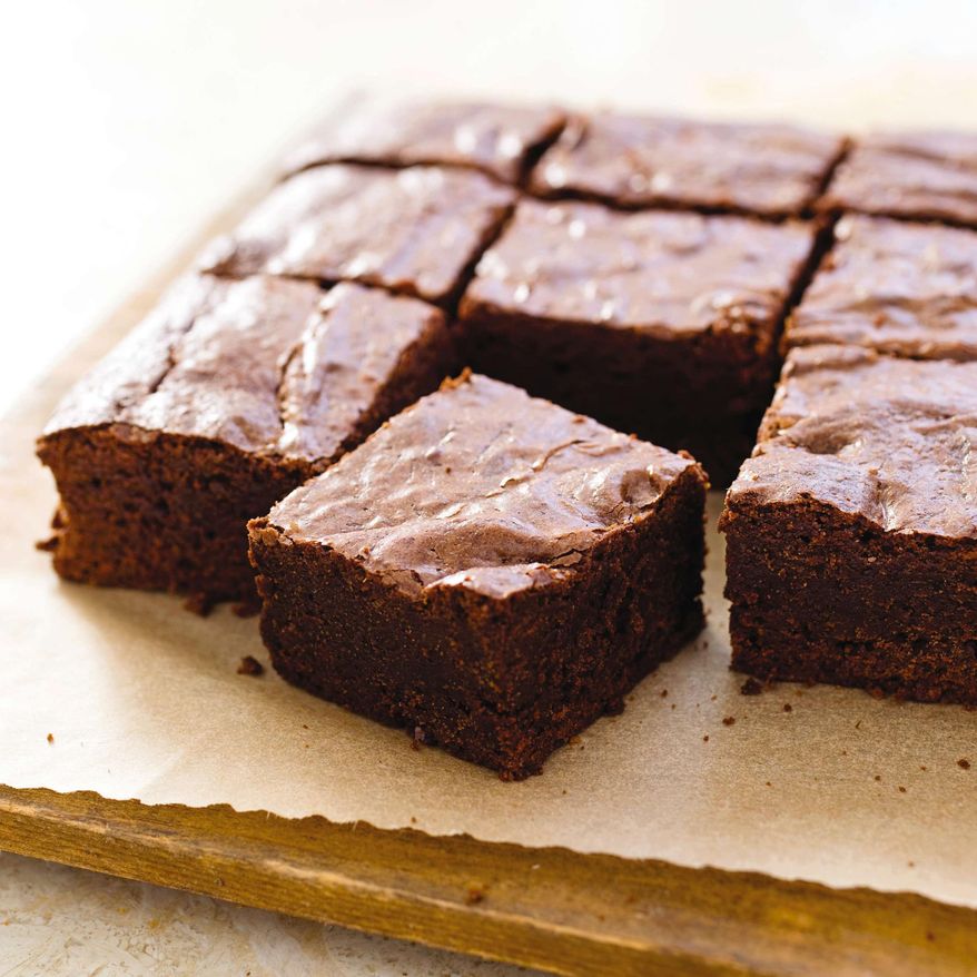 This undated photo provided by America's Test Kitchen in April 2019 shows Fudgy Brownies in Brookline, Mass. This recipe appears in the cookbook "The Perfect Cookie." (Carl Tremblay/America's Test Kitchen via AP)