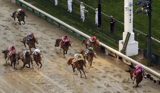 Luis Saez rides Maximum Security to the finish line first against Flavien Prat on Country House during the 145th running of the Kentucky Derby horse race at Churchill Downs Saturday, May 4, 2019, in Louisville, Ky. Country House was declared the winner after Maximum Security was disqualified following a review by race stewards. (AP Photo/Charlie Riedel) **FILE**