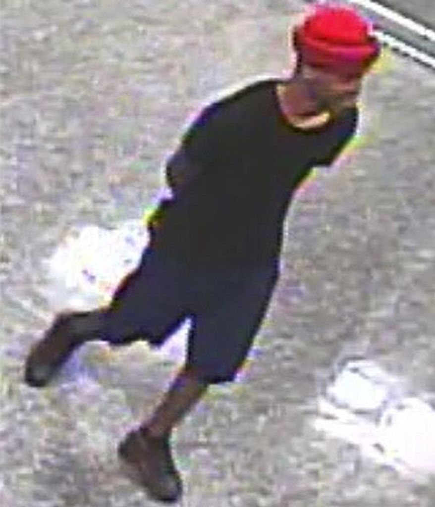 In this May 2019 security camera image released by the Mississippi Bureau of Investigations, a suspect in the death of a Biloxi police officer is seen. Authorities say the man walked up to the Biloxi officer in the station's parking lot Sunday night, May 5 shot him multiple times and then ran off. (Mississippi Bureau of Investigations via AP)