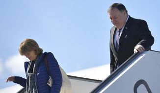 Secretary of State Mike Pompeo and Sen. Lisa Murkowski, R-Alaska, steps off a plane upon arrival in Rovaniemi, Finland, Monday, May 6, 2019. (Mandel Ngan/Pool Photo via AP)