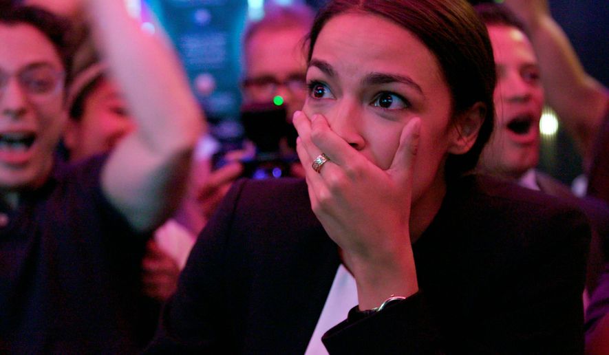 Rep. Alexandria Ocasio-Cortez took to social media to express confusion about a garbage disposal and amazement at plants in her community garden plot. (Associated Press)