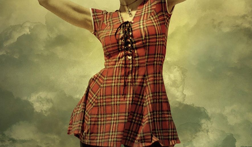 This cover image released by Viking shows "No Walls and the Recurring Dream," a memoir by Ani DiFranco. (Viking via AP)