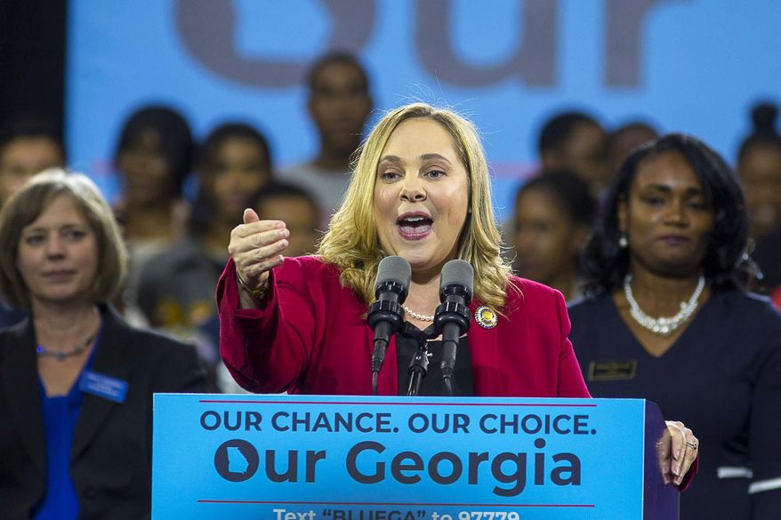 FILE - In this Friday, Nov. 2, 2018, file photo, Sarah Riggs Amico, Democratic nominee for lieutenant governor, speaks during a rally for Democratic gubernatorial candidate Stacey Abrams, at Morehouse College in Atlanta. Georgia’s highest court plans to hear an appeal of the dismissal of a lawsuit challenging the outcome of the election for lieutenant governor in November, between Republican Geoff Duncan and Democrat Sarah Riggs Amico. (Alyssa Pointer/Atlanta Journal-Constitution via AP, File)