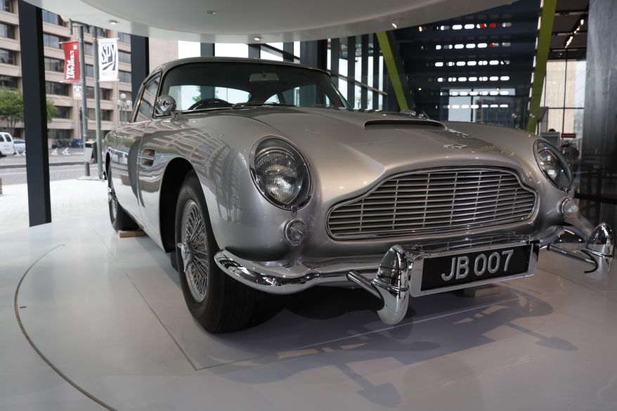 A car used in a James Bond movie adorns the lobby of the new International Spy Museum, Tuesday April 30, 2019, in Washington. Take a back seat James Bond, because it’s the stories of real-life spies that take center stage at the new International Spy Museum in Washington. The expanded museum in its new building will open May 12. (AP Photo/Jacquelyn Martin)