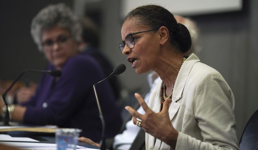 Former Environment Minister Marina Silva speaks to reporters in Sao Paulo, Brazil, Wednesday, May 8, 2019. Eight former environmental ministers presented a joint letter denouncing the administration of President Jair Bolsonaro. (AP Photo/Victor R. Caivano)
