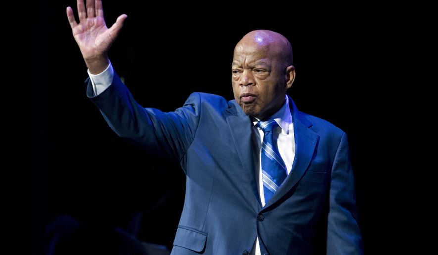 FILE - This Jan. 3, 2019 file photo shows Rep. John Lewis, D-Ga., during a swearing-in ceremony of Congressional Black Caucus members of the 116th Congress in Washington. CNN Films is developing a documentary on civil rights icon and Georgia congressman John Robert Lewis. The network announced Wednesday, May 8, that “Gideon’s Army” director Dawn Porter is helming the project. She began shooting the 79-year-old Lewis last year ahead of the midterm elections.  (AP Photo/Jose Luis Magana, File)