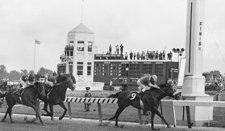 FILE - In this May 4, 1968, file photo, Dancer&#39;s Image, right, jockey Bob Ussery up, crosses the finish line to win the 94th running of the Kentucky Derby at Churchill Downs in Louisville, Ky. Forward pass, center, was second, and Francie&#39;s Hat, left, was third. Sent off as the 7-2 second choice, Dancer&#39;s Image rallied from last to win by 1 1/2 lengths over Forward Pass. The result was declared official, but Dancer’s Image was later disqualified after traces of phenylbutazone, known as bute, were found in Dancer&#39;s Image&#39;s post-race urinalysis. Dancer&#39;s Image was placed 14th and last; Forward Pass was declared the winner. (AP Photo/File)