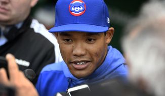 Chicago Cubs shortstop Addison Russell speaks to the media in the dugout before a baseball game against the Miami Marlins, Wednesday, May 8, 2019, in Chicago. Russell rejoins the team after completing a 40-game suspension for violating Major League Baseball&#39;s domestic violence policy and spending extra time in the minors to get ready. (AP Photo/Paul Beaty)