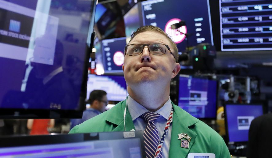 Trader Ryan Falvey works on the floor of the New York Stock Exchange, Thursday, May 9, 2019. Stocks are opening broadly lower on Wall Street as investors keep a close eye on trade talks between the U.S. and China. (AP Photo/Richard Drew)