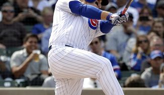 Chicago Cubs&#39; Anthony Rizzo hits a two-run home run during the fifth inning of a baseball game against the Miami Marlins, Thursday, May 9, 2019, in Chicago. (AP Photo/Nam Y. Huh)