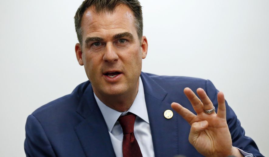 Oklahoma Gov. Kevin Stitt answers a question during a news conference, Thursday, May 9, 2019, in Oklahoma City. (AP Photo/Sue Ogrocki)