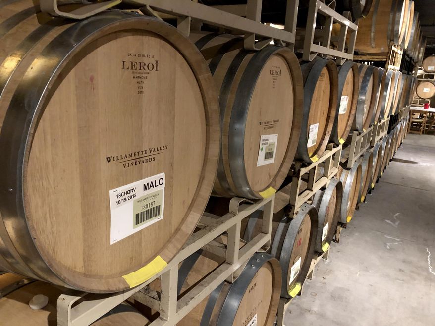 FILE - In this Jan. 25, 2019, photo Chardonnay wine ages in barrels at Willamette Valley Vineyards in Turner, Ore. On May 9, the Labor Department reports on U.S. producer price inflation in April. (AP Photo/Andrew Selsky, File)