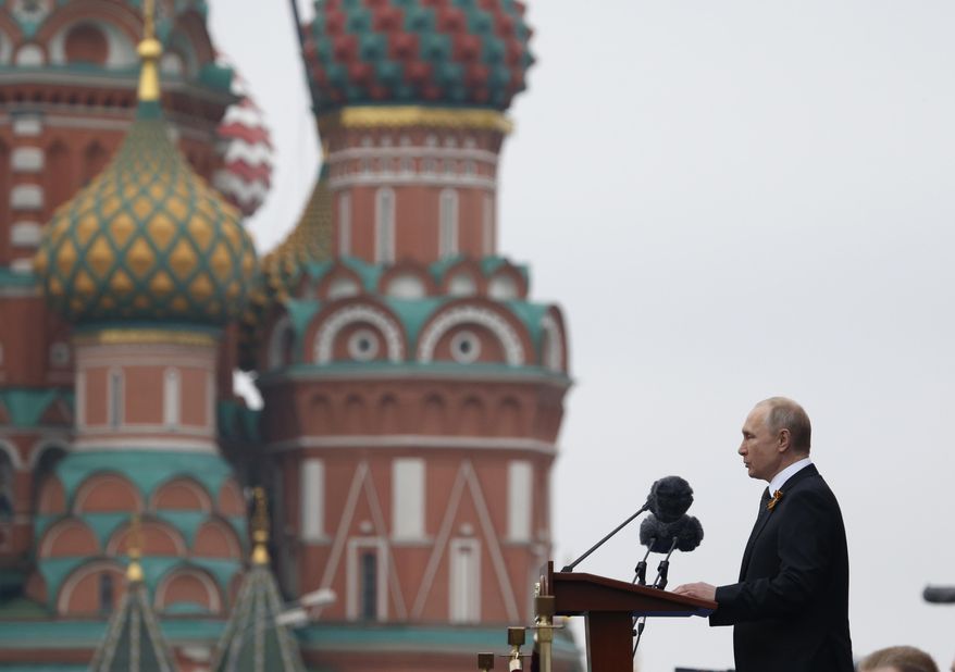 Russian President Vladimir Putin speaks during the Victory Day military parade marking 74 years since the victory in WWII in Red Square in Moscow, Russia, Thursday, May 9, 2019. (AP Photo/Alexander Zemlianichenko)