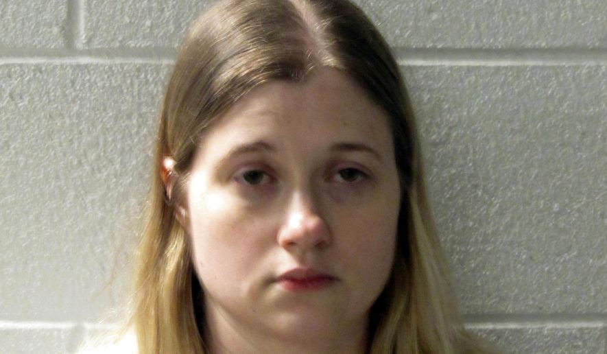 CORRECTS NAME TO KRISTA NOELLE MADDEN, NOT KRISTA LOWELL GRIFFIN - This photo made available by the Henderson County Sheriff's Office, N.C., shows Krista Noelle Madden who was arrested on Friday, May 10, 2019. Her claim that her 7-week-old baby was kidnapped quickly unraveled after the infant was found at the bottom of a 75-foot ravine in the North Carolina mountains, law enforcement officials said Friday. (Henderson County Sheriff's Office via AP)