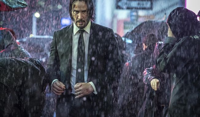 This image released by Lionsgate shows Keanu Reeves in a scene from &amp;quot;John Wick: Chapter 3 - Parabellum.&amp;quot; (Niko Tavernise/Lionsgate via AP)