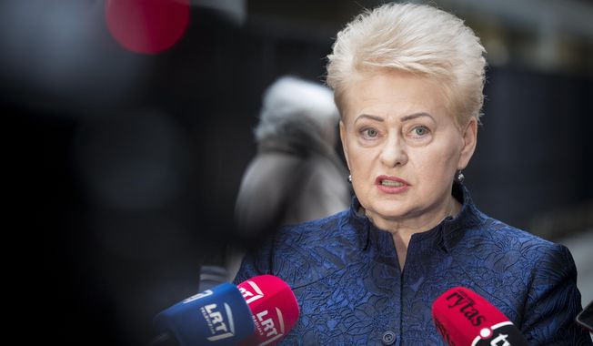 Lithuania&#x27;s President Dalia Grybauskaite speaks to the members of press at a polling station during the advance presidential elections in Vilnius, Lithuania, Tuesday, May 7, 2019. Lithuanians will head to the polls on Sunday, May 12, in a first round of presidential elections. (AP Photo/Mindaugas Kulbis)