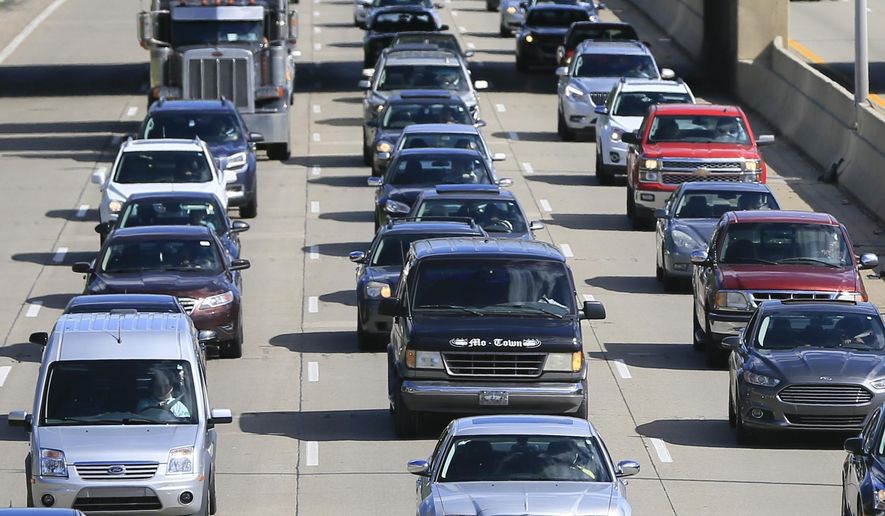 In a June 23, 2015, file photo, traffic heads north along the Lodge freeway in Detroit. (AP Photo/Carlos Osorio, File)