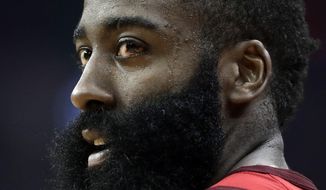 Houston Rockets&#39; James Harden stands on the court during the first half in Game 6 of the team&#39;s second-round NBA basketball playoff series against the Golden State Warriors on Friday, May 10, 2019, in Houston. (AP Photo/Eric Gay)